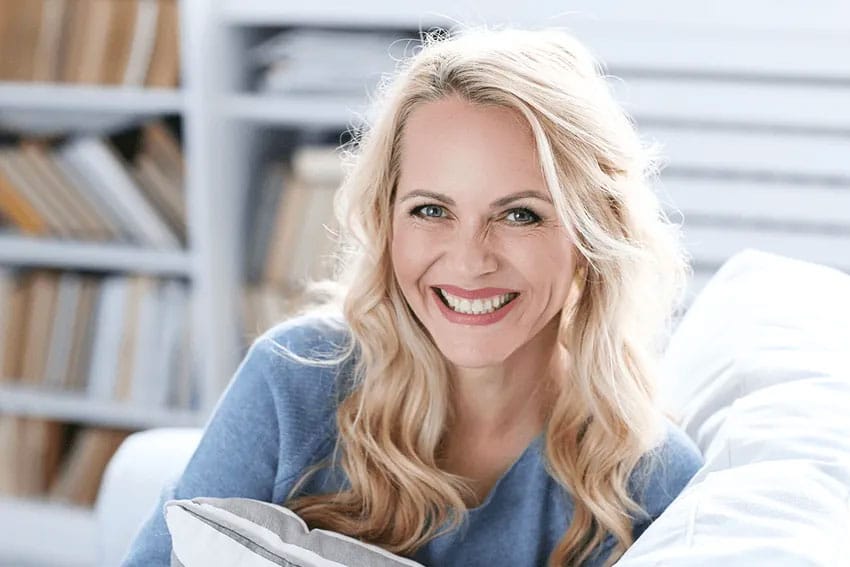 woman relaxing on couch at home