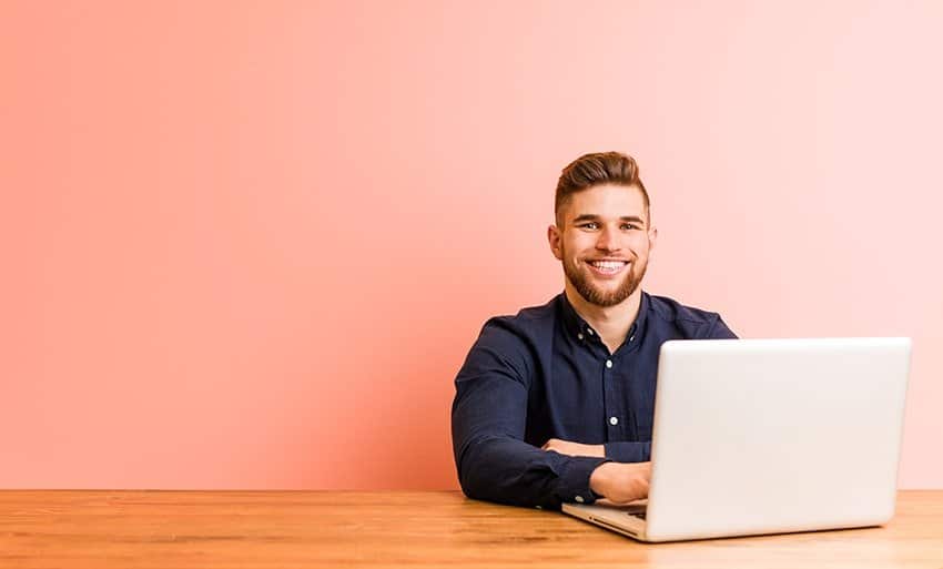 man professional male on his laptop