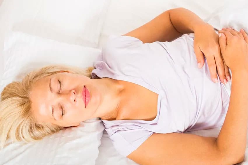 woman relaxing in bed