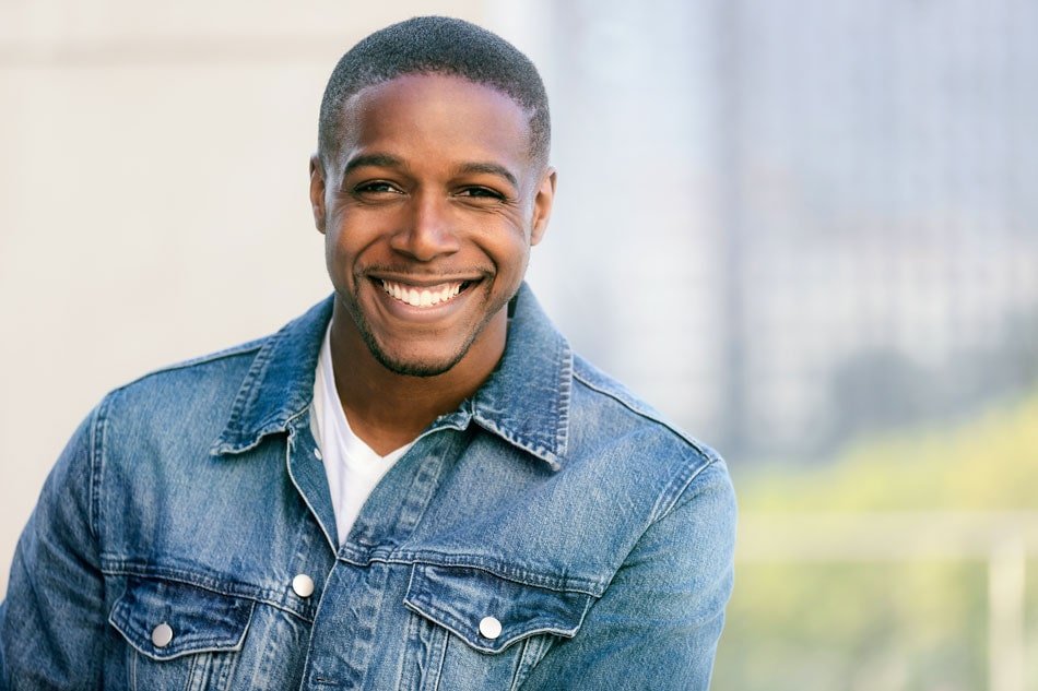 man outside smiling