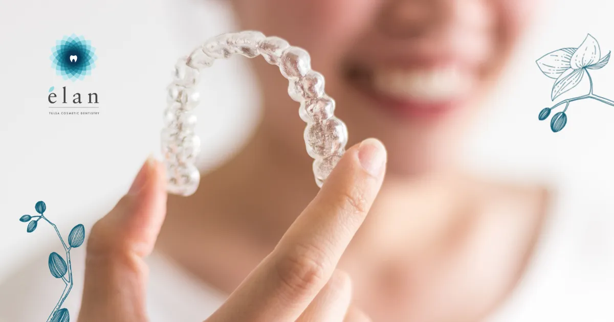 Woman Holding Invisalign Tray