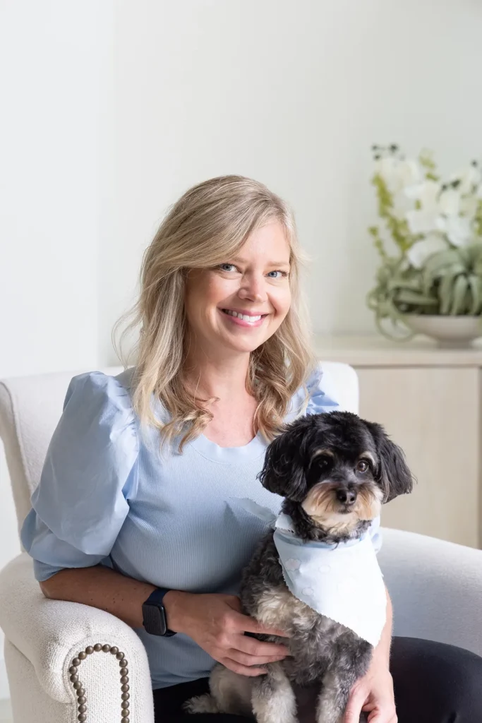 Dr. Meghan Hodges With A Puppy At élan Tulsa Cosmetic Dentistry In Tulsa, Oklahoma