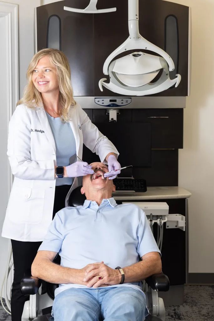 Dr. Meghan Hodges Performing A Dental Cleaning For A Patient At élan Tulsa Cosmetic Dentistry In Tulsa, Oklahoma