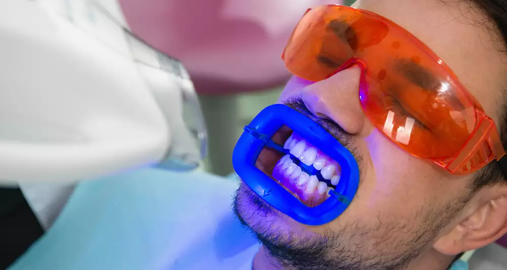 Patient Receiving Zoom Teeth Whitening Treatment At élan Tulsa Cosmetic Dentistry In Tulsa, Oklahoma
