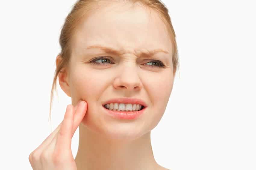 woman with tooth pain