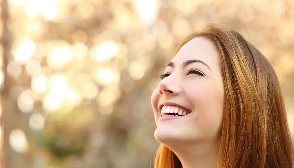 Woman Smiling With Brown Injectable Services Tulsa