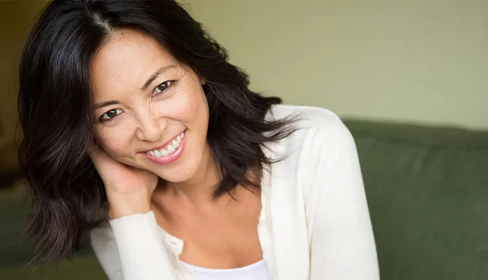 Woman Smiling with Black Hair Dental Bonding Tulsa