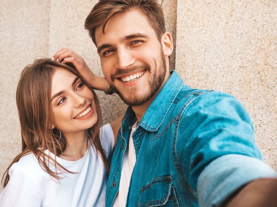 couple posing and smiling