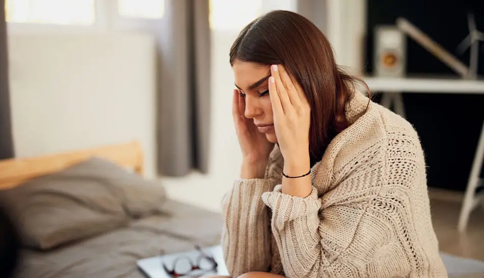 Woman Suffering from Migraine Pain